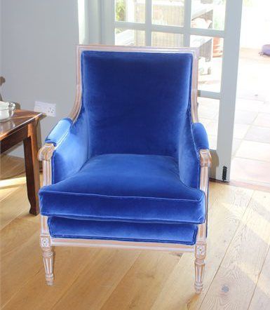 armchair upholstered in royal blue velour