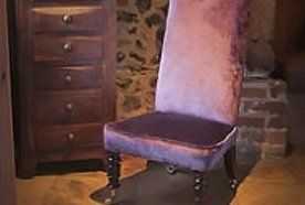 high backed chair in pink velour