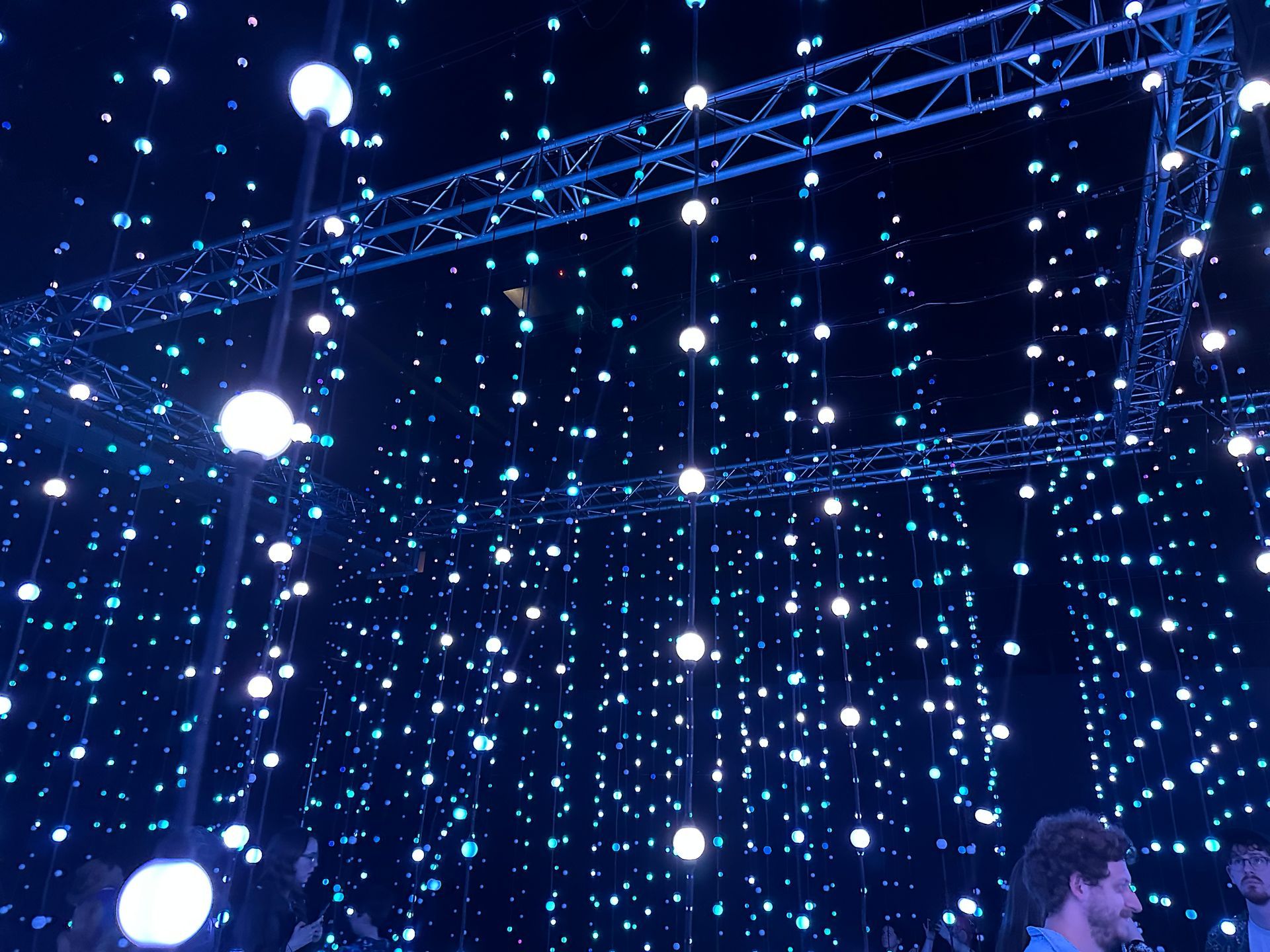 Lots of sparkly lights hanging from the ceiling.