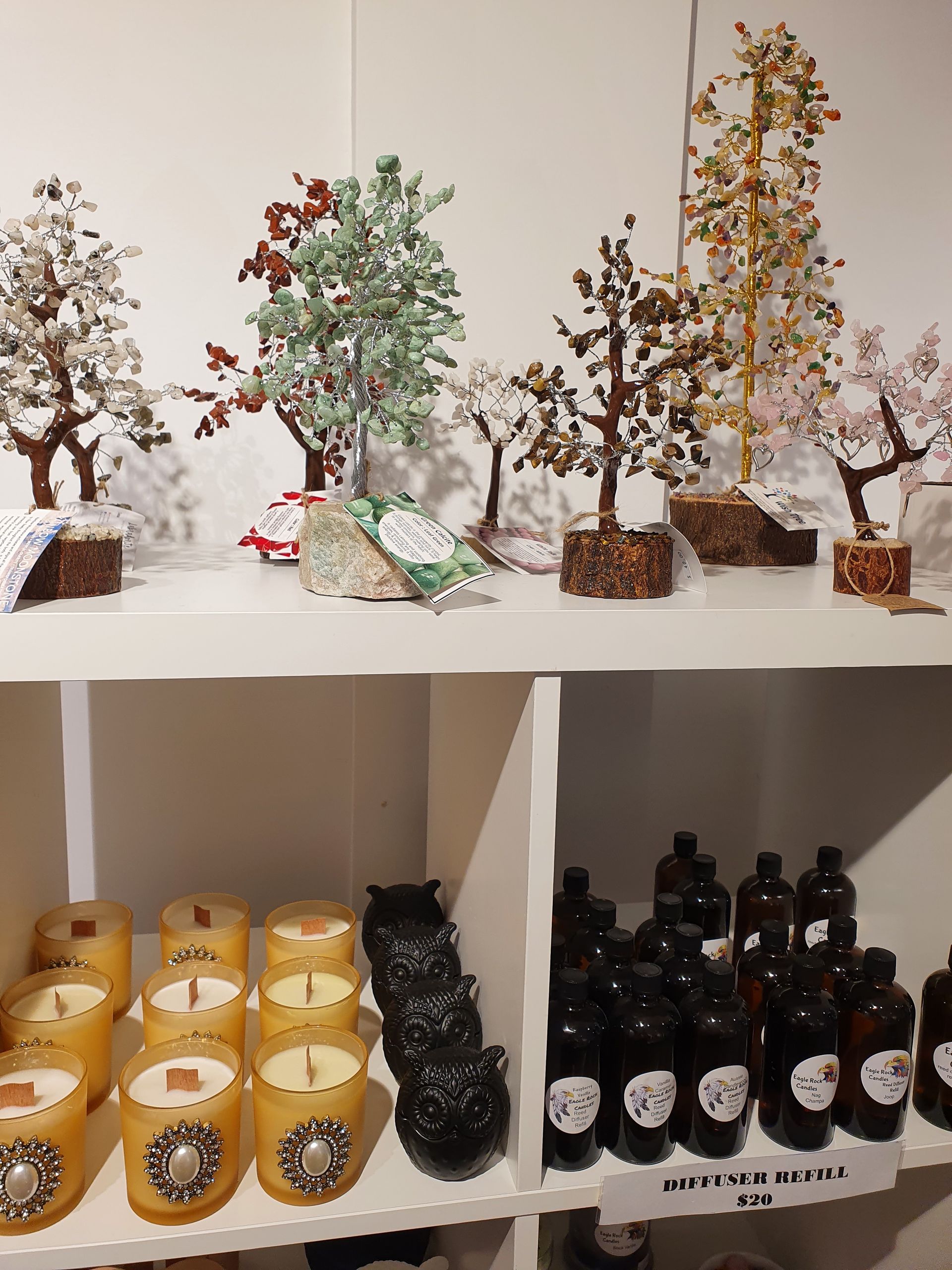 A Shelf with Candles and Bottles on It — Eagle Rock Candles in Wodonga, VIC
