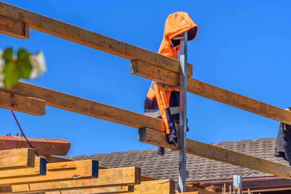 Coat hanged at the top of the wood — Builder in Deepwater, QLD
