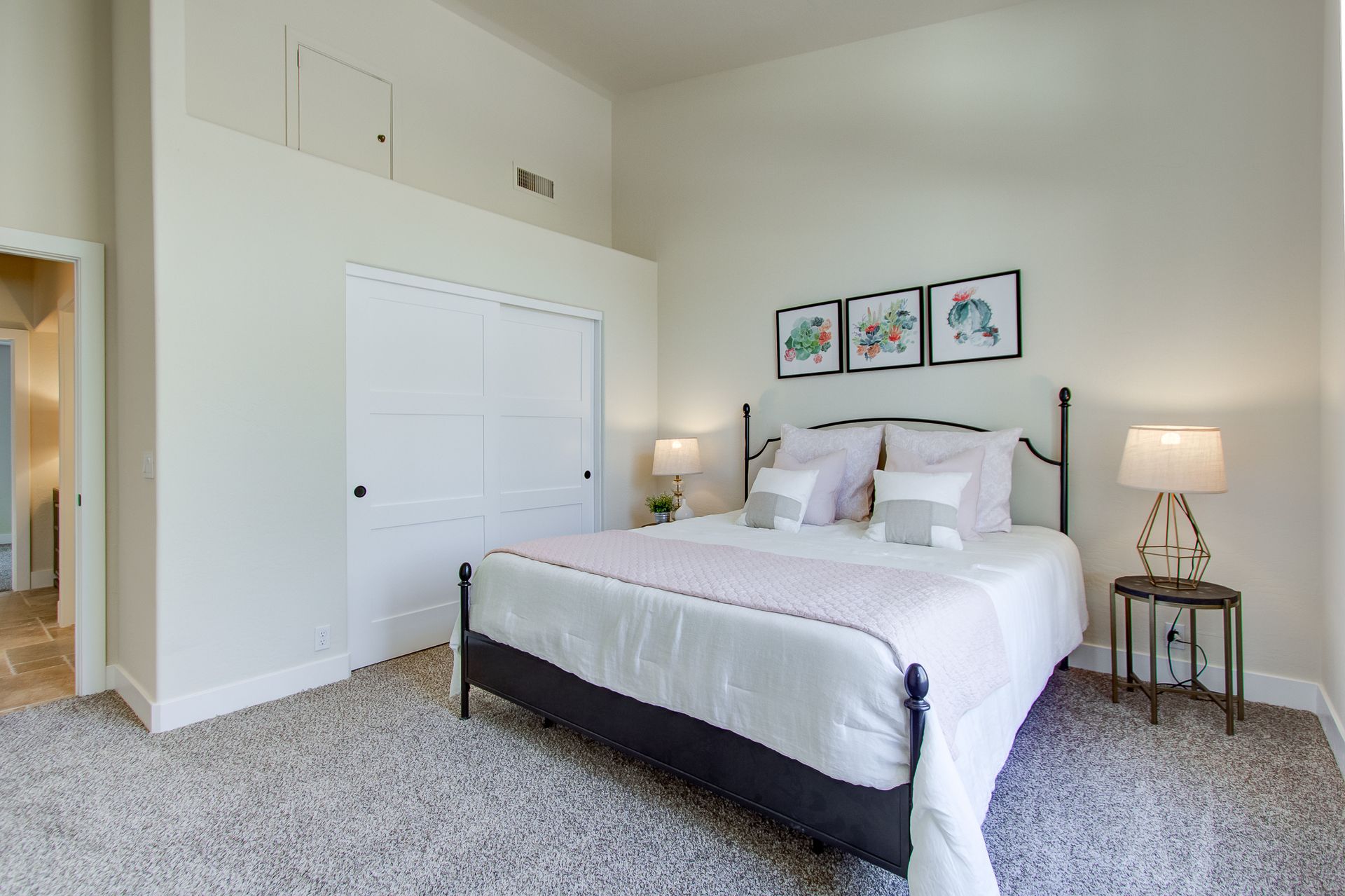 There is a large bed in the middle of the room.