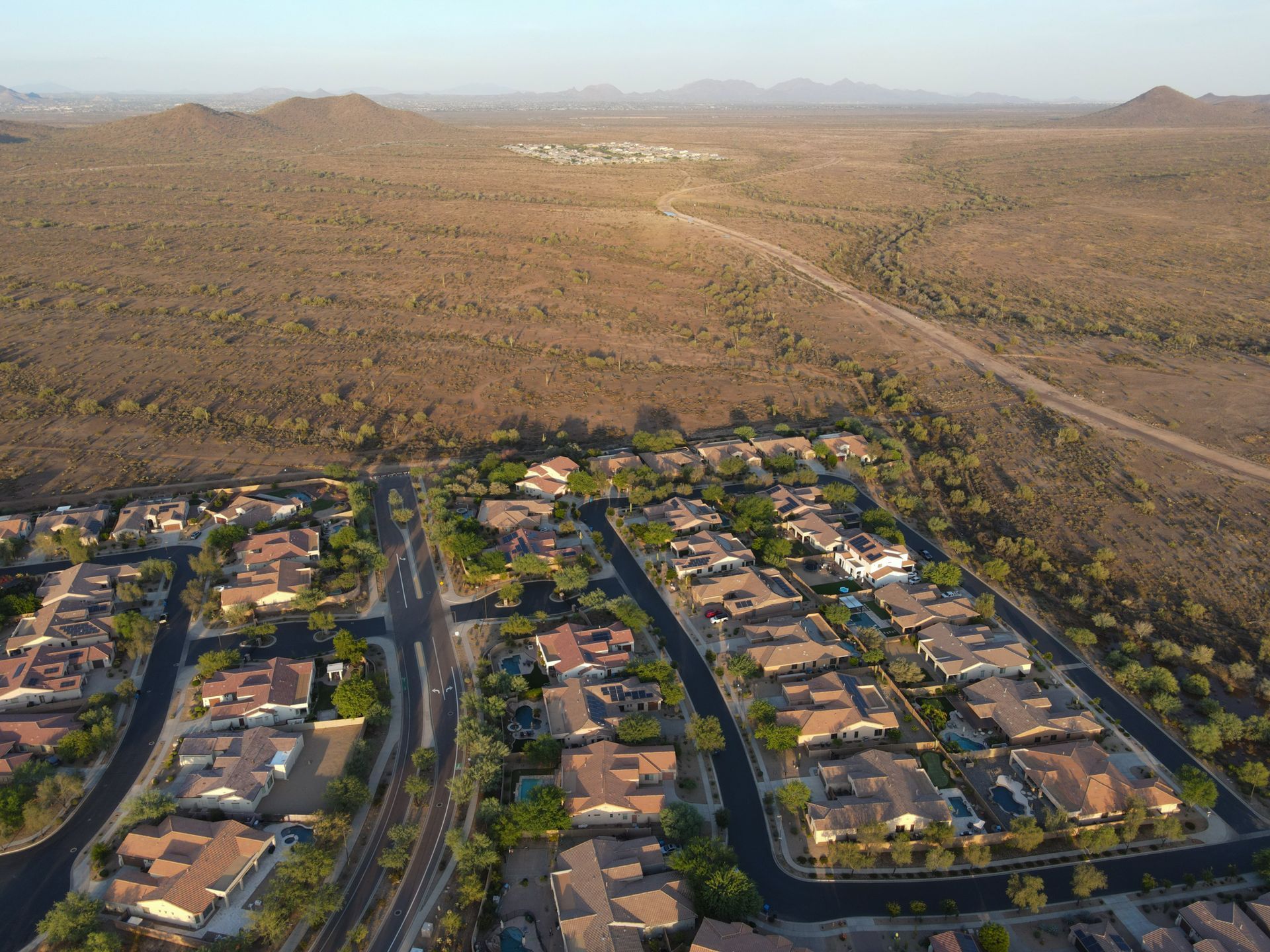 An aerial view of a residential area in the desert