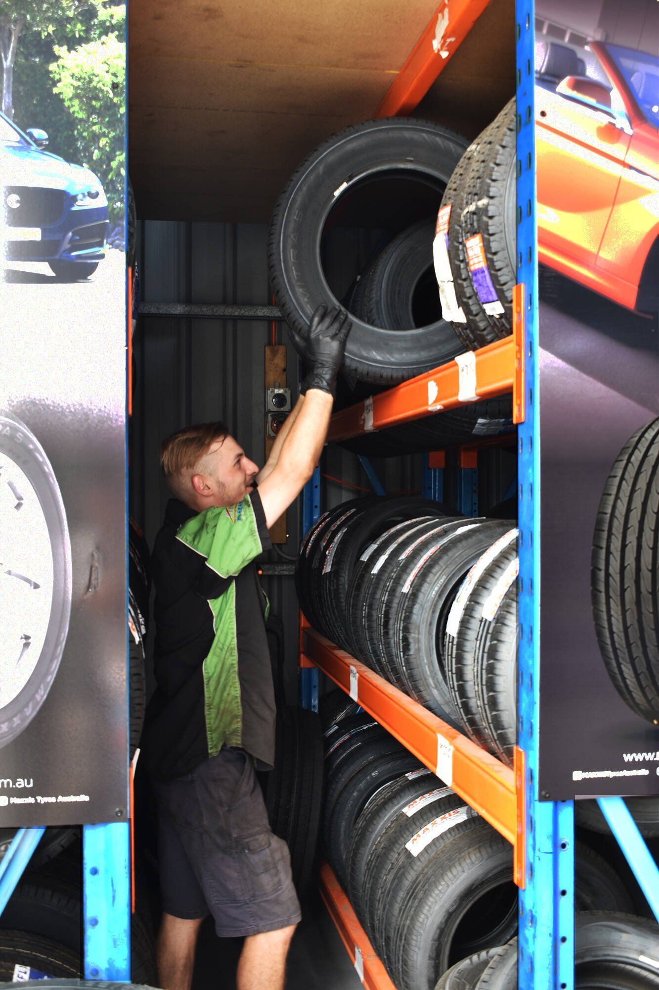 mechanic+fixing+car+tyre