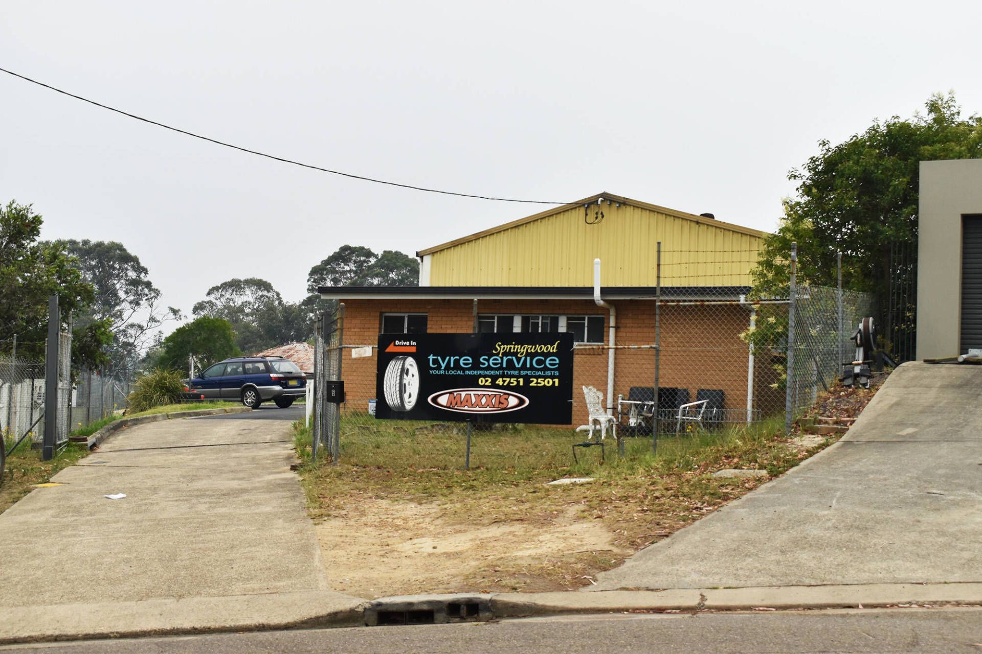 springwood+tyre+service+front+shop+zoom+out+center