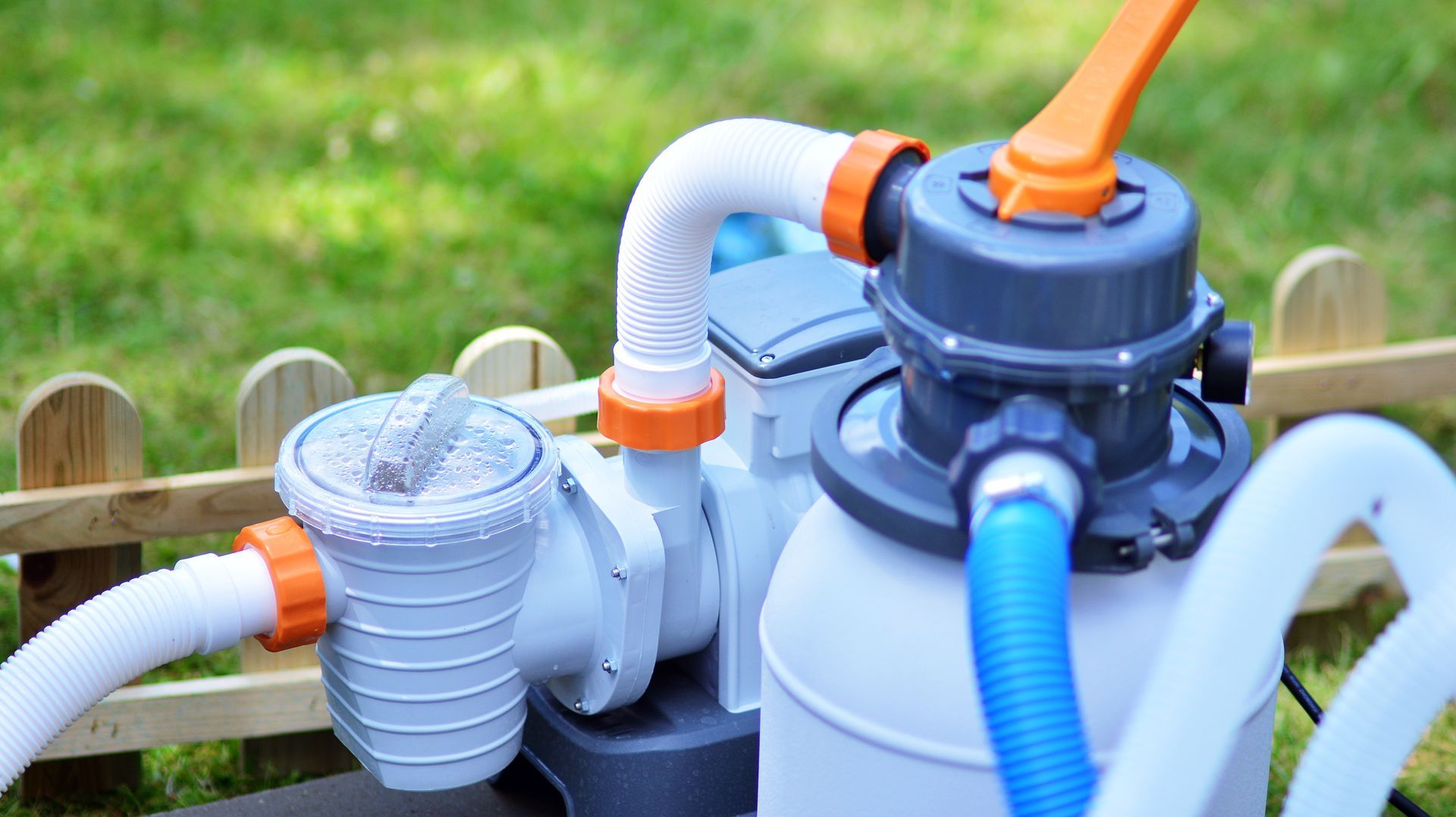 Pool Filter Pump With White and Orange Pipes — Fannie Bay Pool Shop in Palmerston, NT