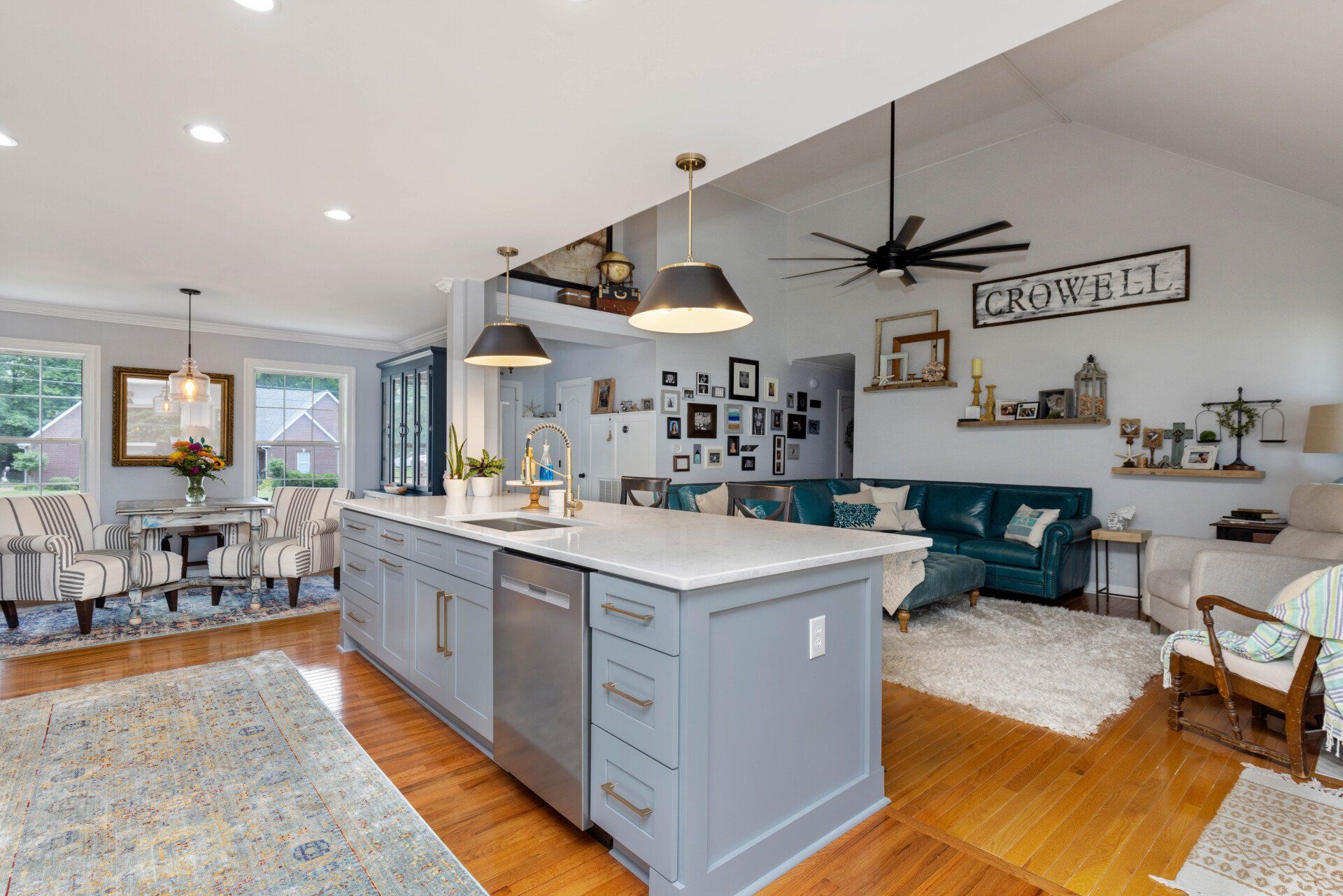 A kitchen with a large island in the middle of the room.