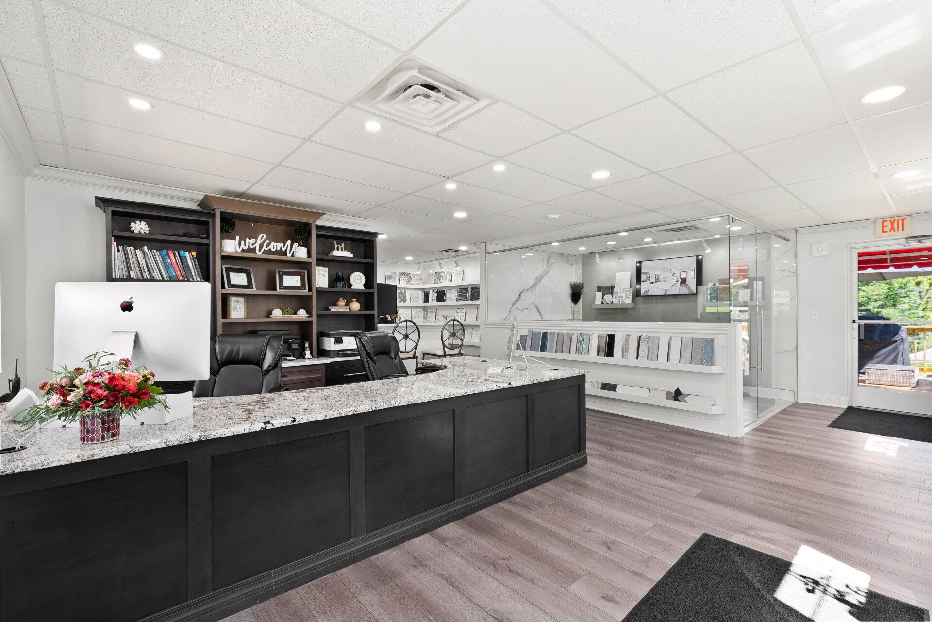 A large room with a large counter and a computer on it.