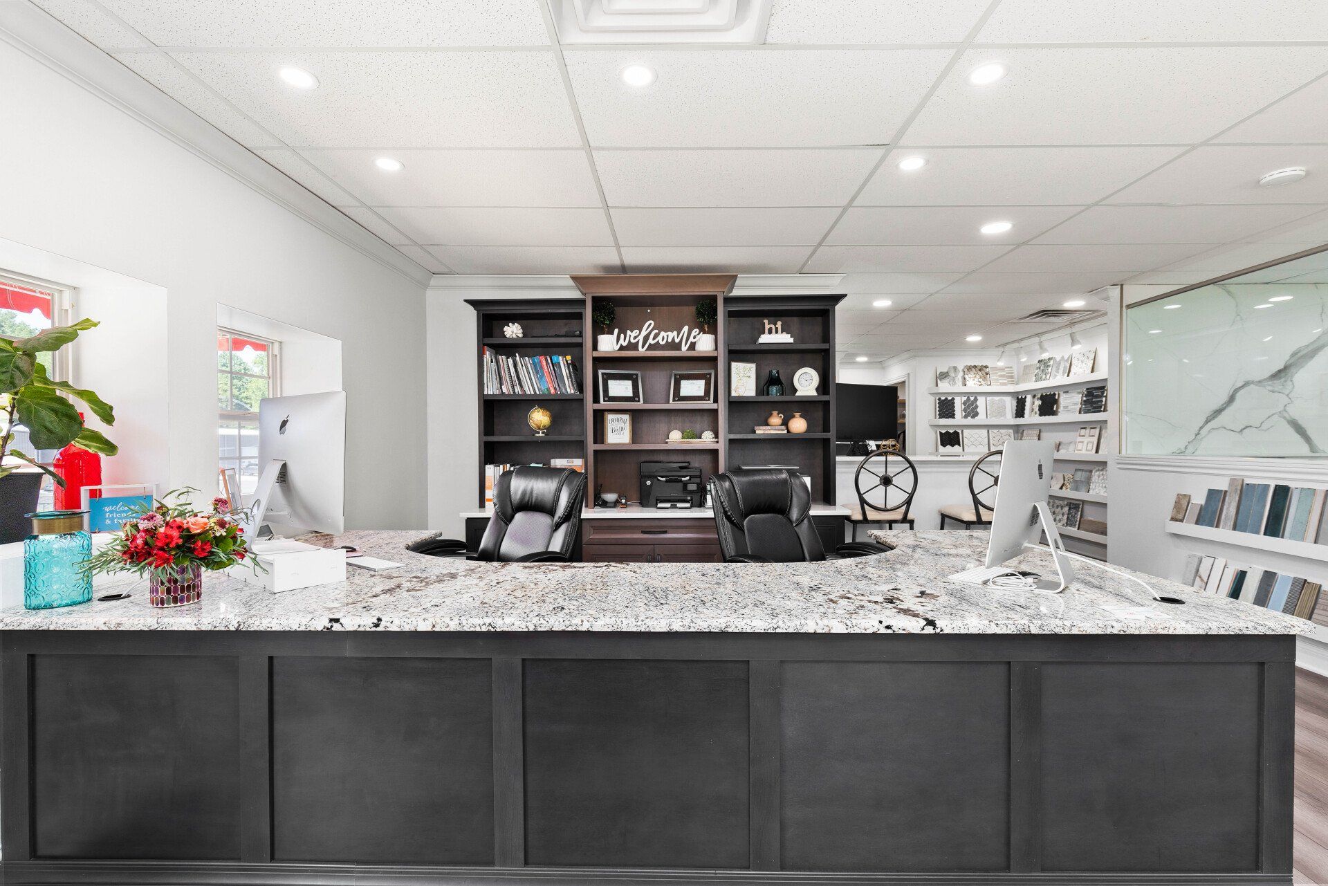 There is a large counter in the middle of the room.