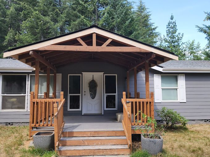 A large house is being built in a residential area.