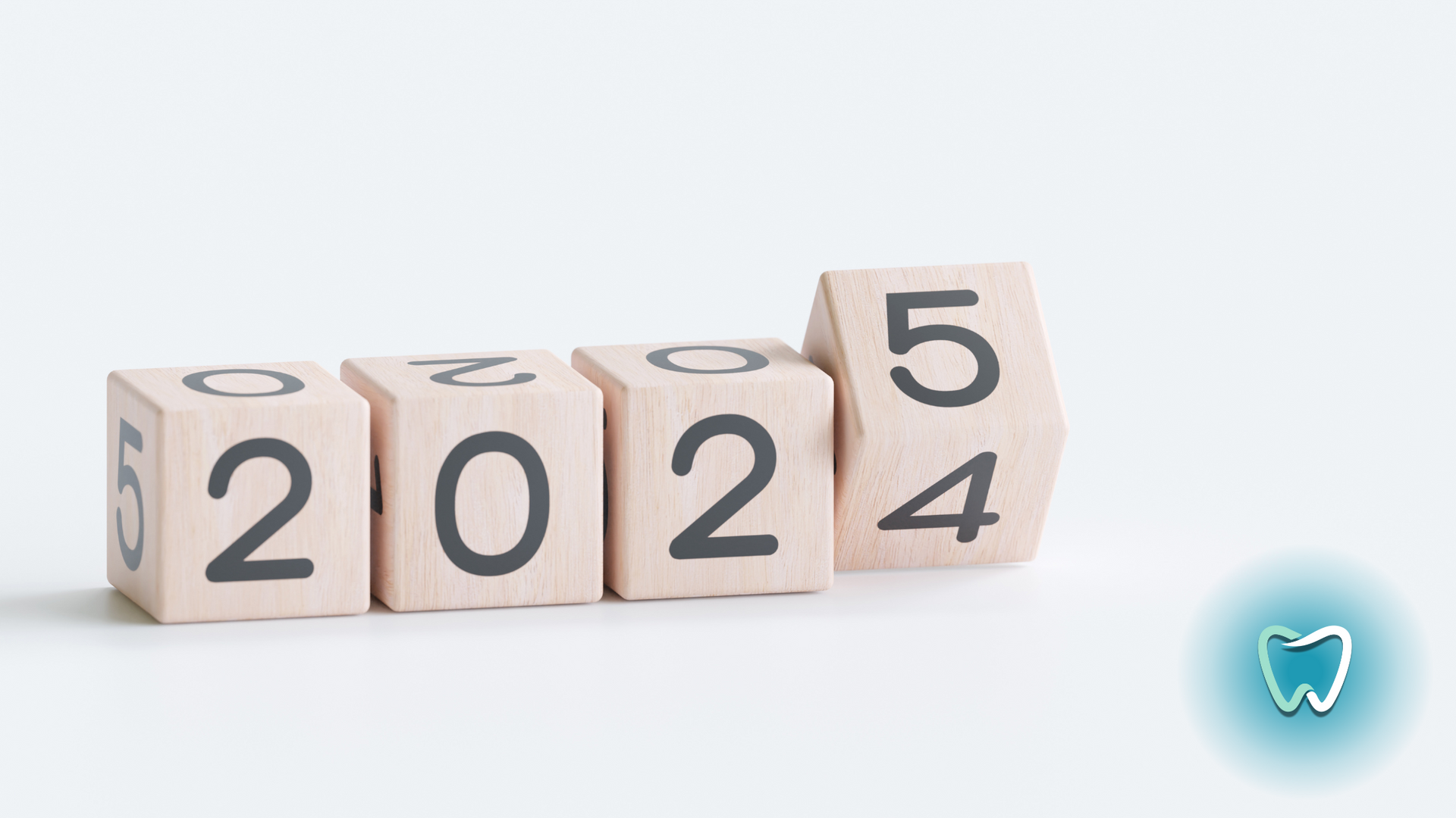 A row of wooden blocks with the numbers 2022 and 2024 on them