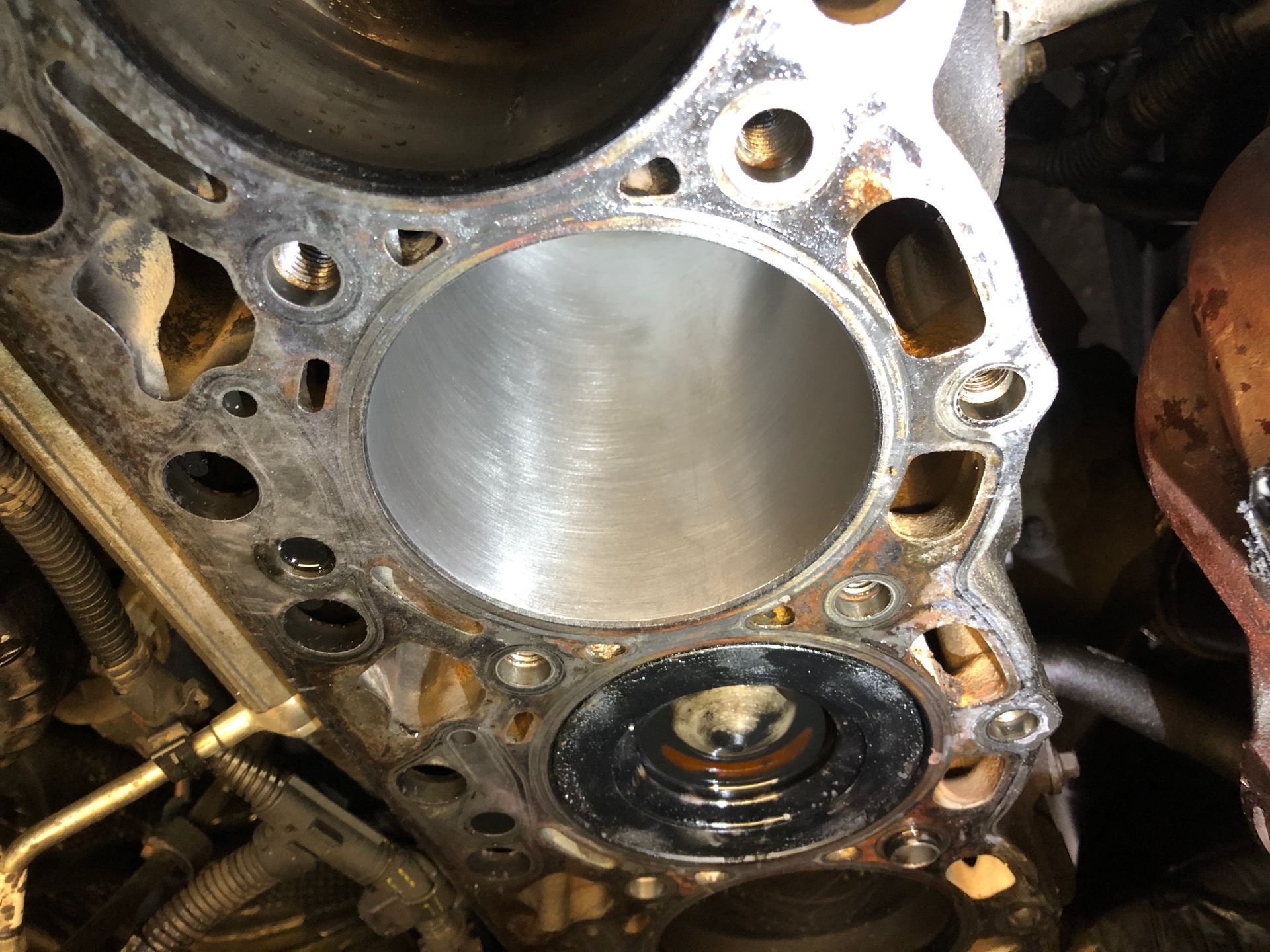 A close up of a cylinder block of a car engine.