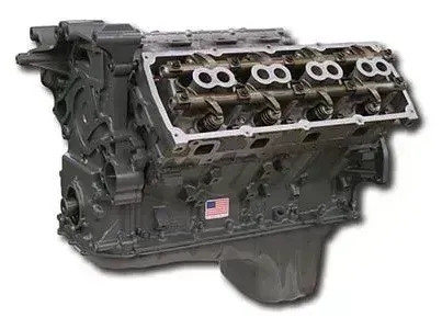 A close up of a v8 engine on a white background.