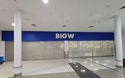 A bigw store is closed in a shopping mall — Signworld In Mitchell, ACT