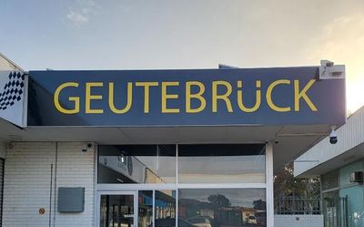 A Building With a Sign That Says Geutebruck on It — Signworld In Mitchell, ACT