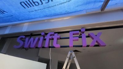 A Purple Sign That Says Swift Fix on It — Signworld In Mitchell, ACT