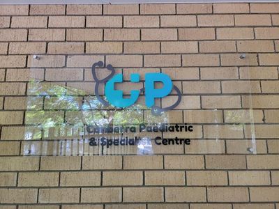 A Sign on a Brick Wall That Says Gp on It — Signworld In Mitchell, ACT