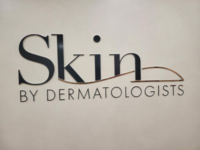 A Sign That Says Skin by Dermatologists on It — Signworld In Mitchell, ACT