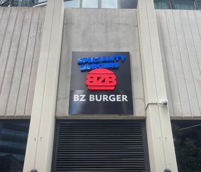 A bz burger sign on the side of a building — Signworld In Mitchell, ACT