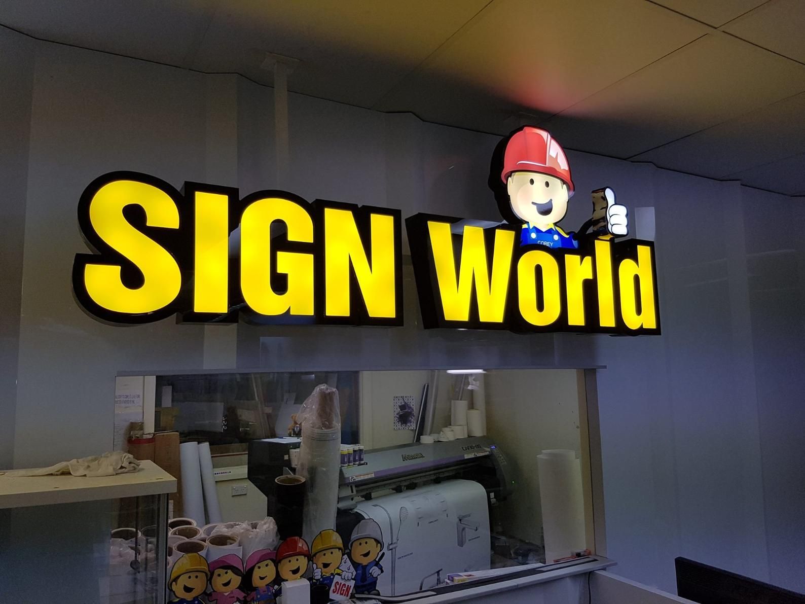 A Sign That Says Sign World With A Man In A Hard Hat On It — Signworld In Mitchell, ACT
