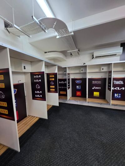 A Locker Room With a Lot of Shelves and Signs on the Wall — Signworld In Mitchell, ACT