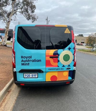 A Blue Van With the Words Royal Australian Mint on the Back — Signworld In Mitchell, ACT
