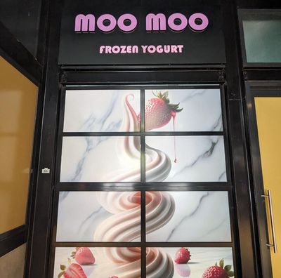 A Store Front With a Sign That Says Moo Moo Frozen Yogurt — Signworld In Mitchell, ACT