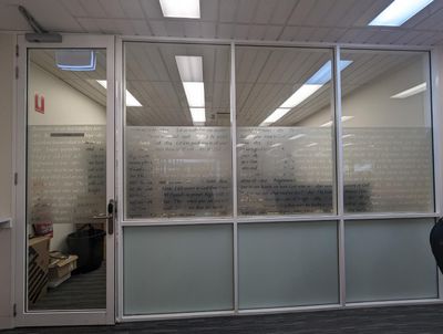 A Room With a Glass Wall and a Door — Signworld In Mitchell, ACT