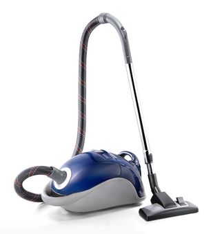 Blue and gray vacuum cleaner with hose and cleaning head, isolated on white background.