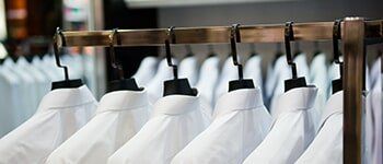 Cleaning white polo shirts — Laundry in Portland, OR