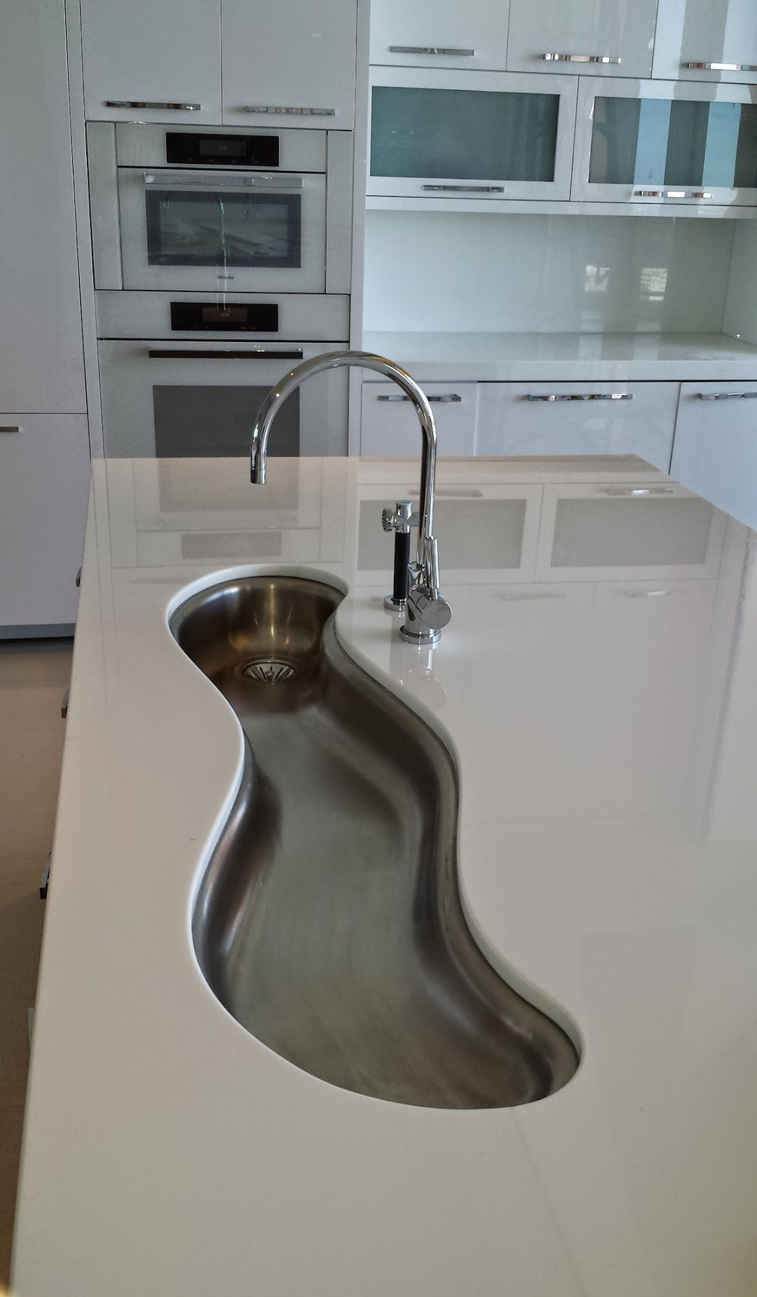 A bathtub with a shower head attached to it in a bathroom.