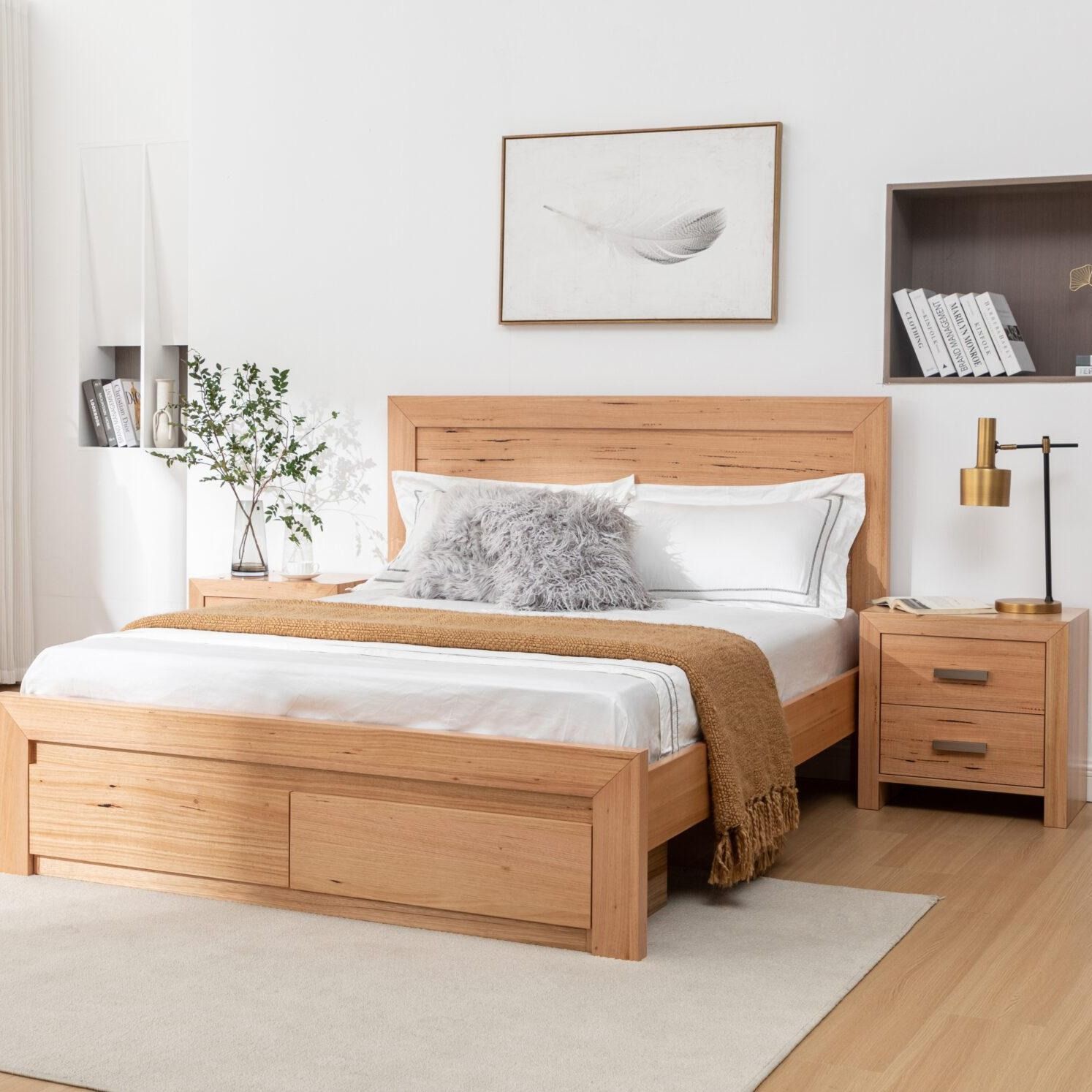 A bedroom with a bed , dresser , nightstand and mattress.