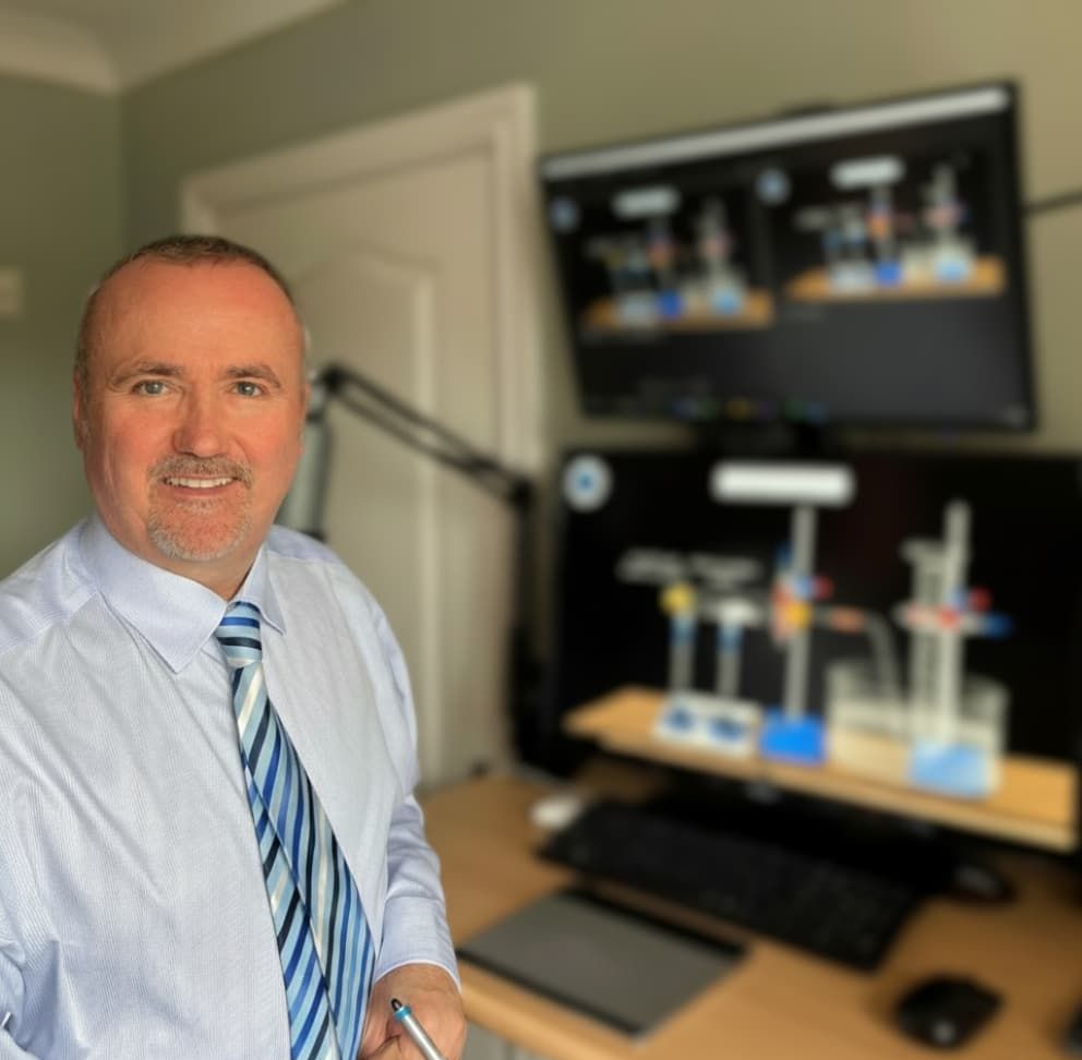 Professional photo of Nigel Straney, an expert online chemistry tutor, in his office.