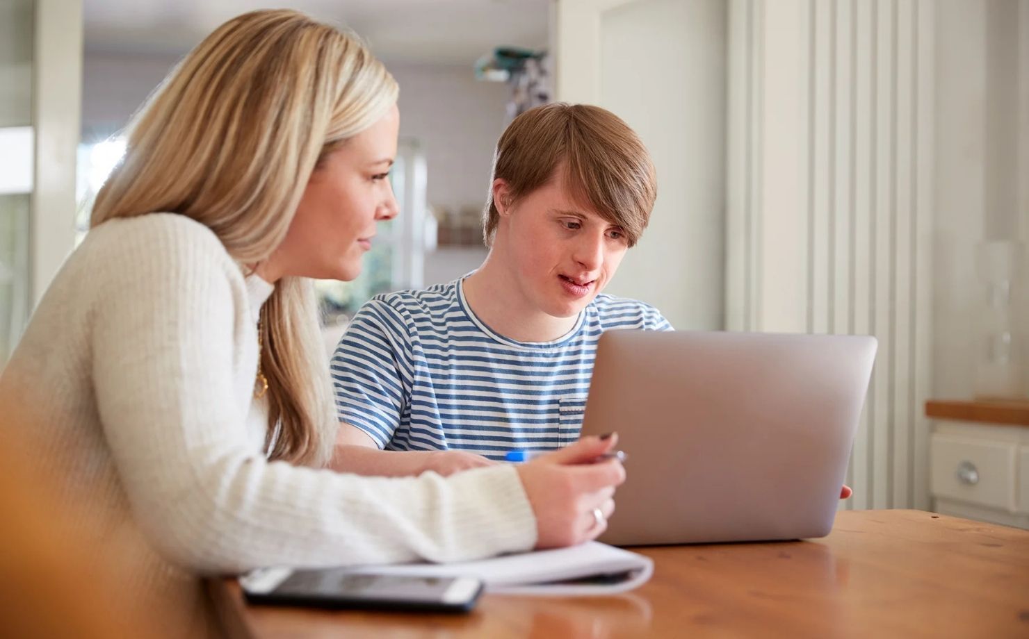 Support Worker helps NDIS Participant for Life Skills Development .