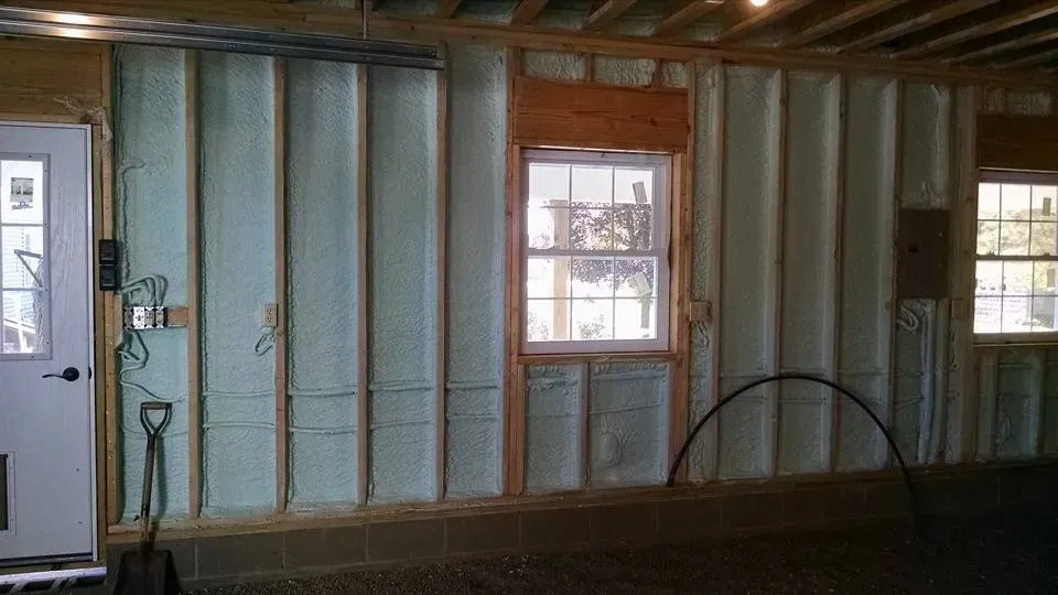 A room with a door and a window in it.