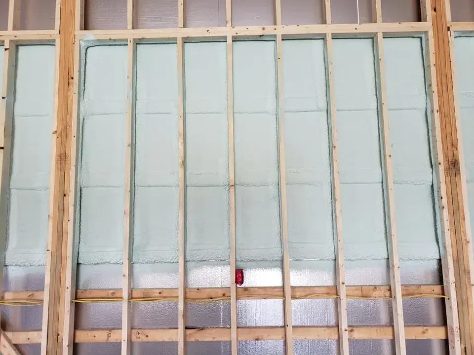 A window is being built in a wooden frame