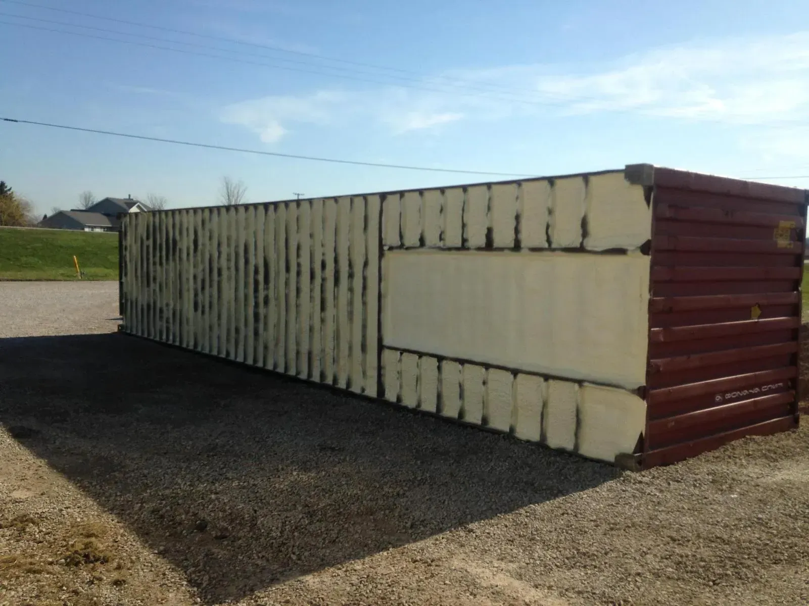 A large container with foam on the side of it