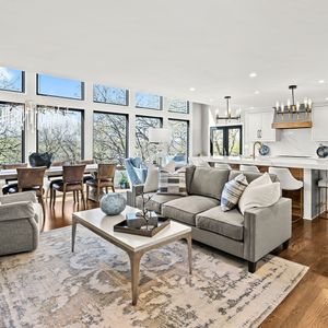 remodeled living room with big windows by Gartman Remodeling in Kansas City 