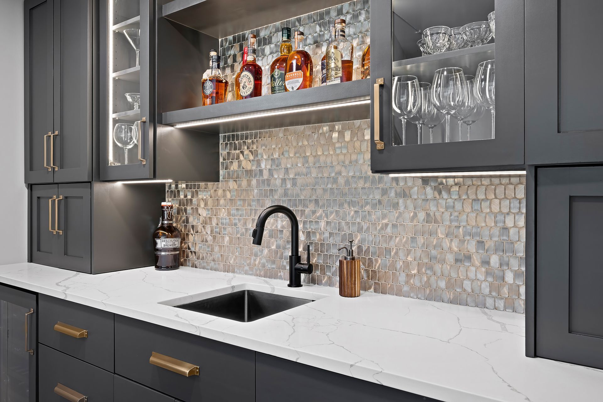 Remodeled kitchen with black sink by Gartman Remodeling in Kansas City