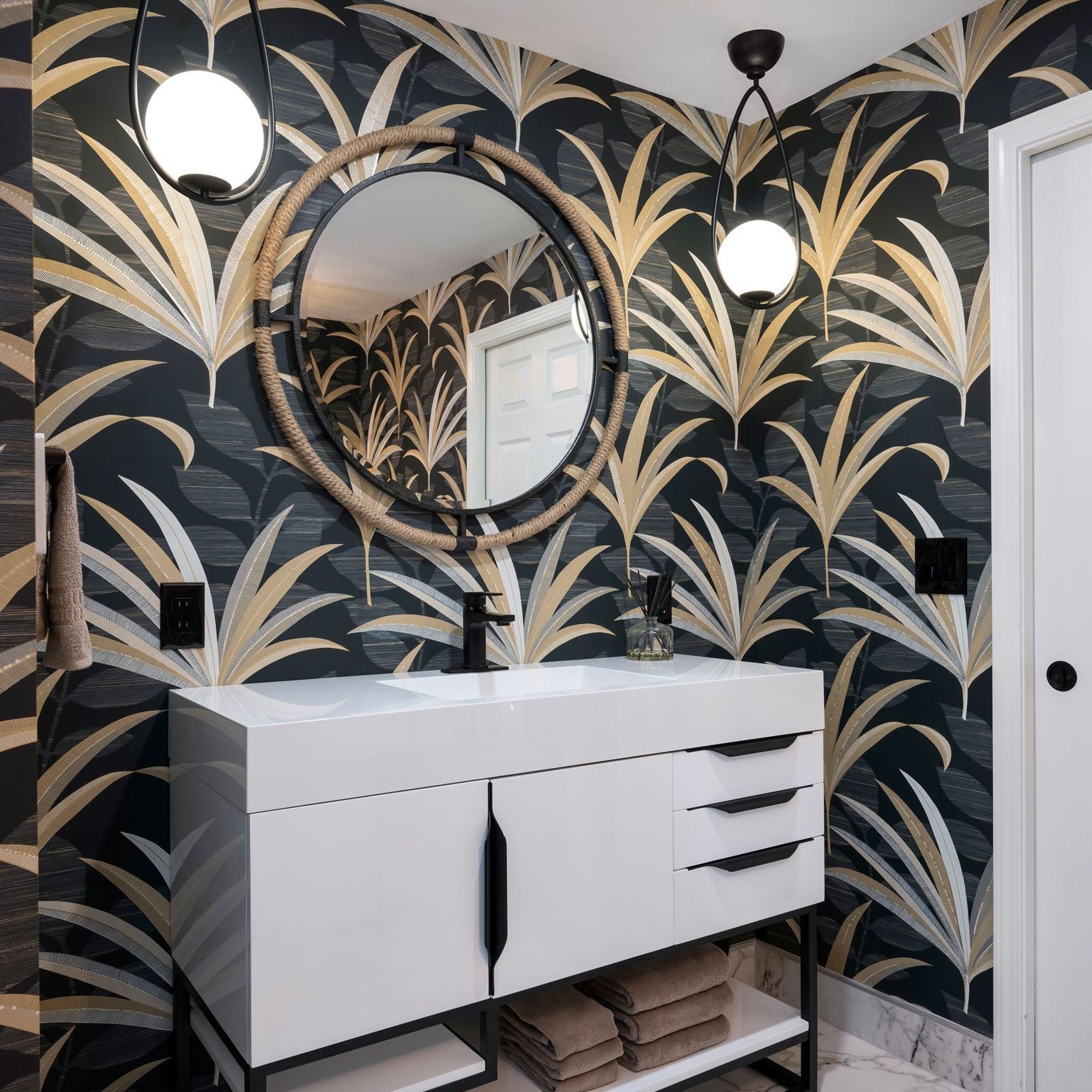 Remodeled bathroom with wall paper by Gartman Remodeling in Kansas City