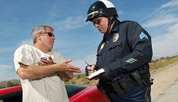 Traffic Cop Talking with Driver - Criminal and Traffic Law Attorneys in Virginia Beach, VA