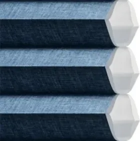 Blue honeycomb cellular shades with white end caps, detail view.