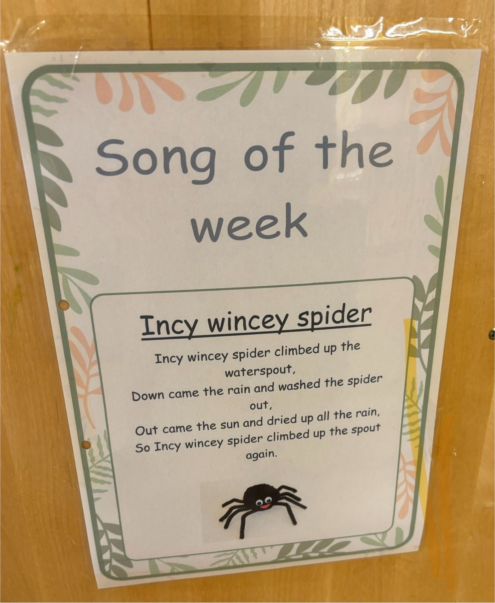A sign that says song of the week on it
