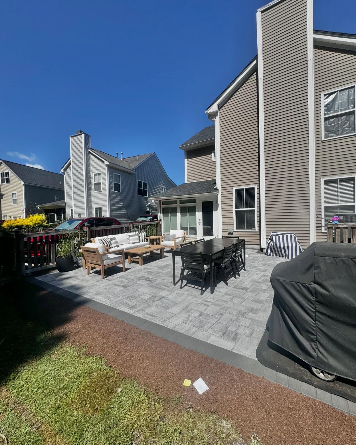 Custom backyard patio with fire pit Mount Pleasant