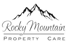 A black and white logo for rocky mountain property care with a mountain in the background.