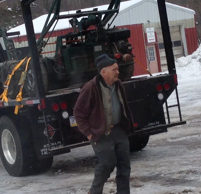 Man with Tractor — Snyder Twp, PA — Ray Burial Vault Co