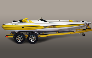 Yellow and white Malibu motorboat on a yellow trailer, with silver wheels.