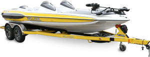 A white and yellow motorboat on a yellow trailer.