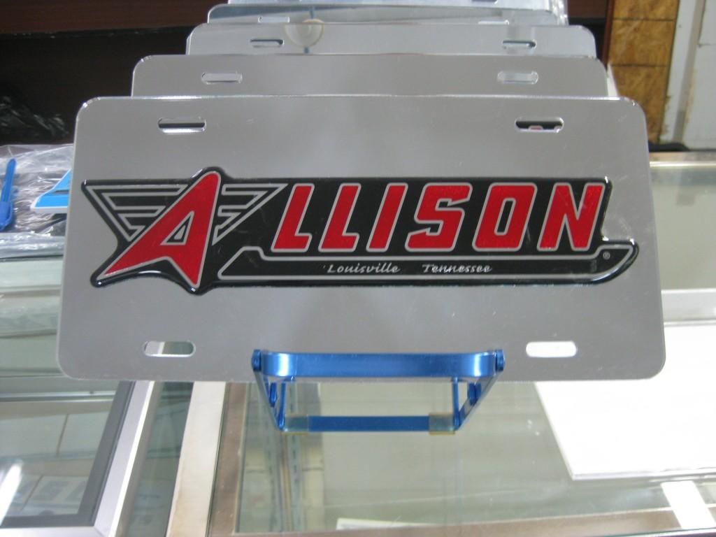 Silver Allison license plates with red and black logo, Louisville, Tennessee.