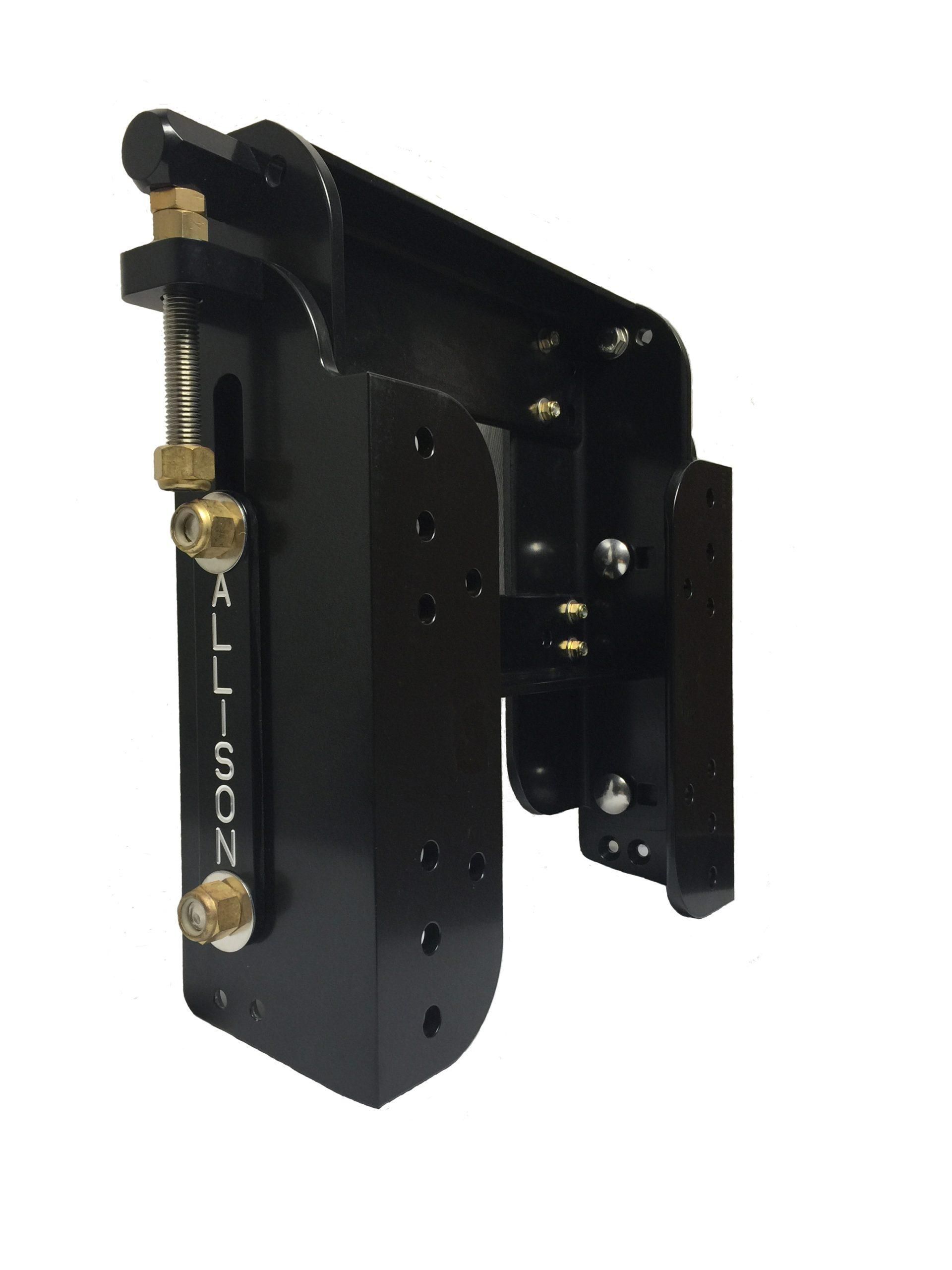 Black, mechanical jack plate with gold-colored hardware, possibly for a boat engine.